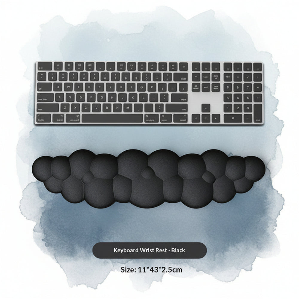 Black keyboard wrist rest with a computer keyboard on a white background