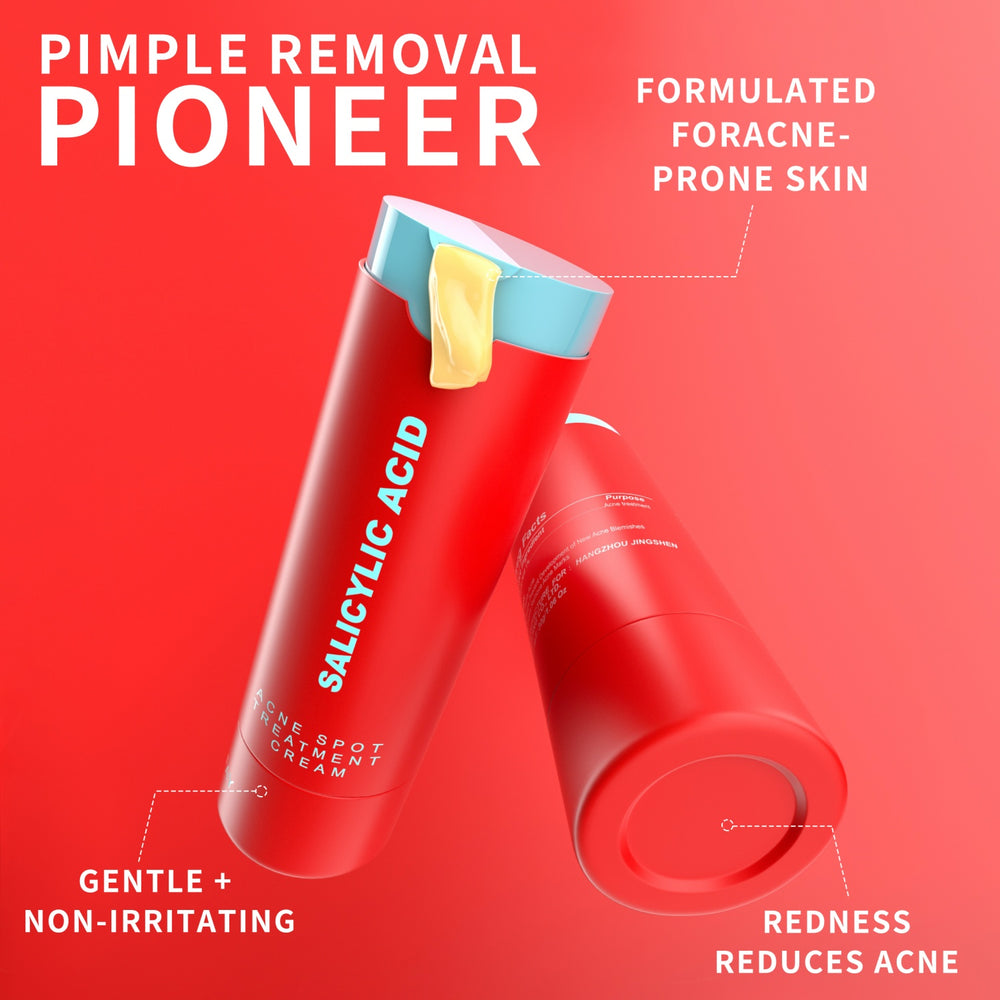 Red bottle of pimple removal cream with salicylic acid on a red background