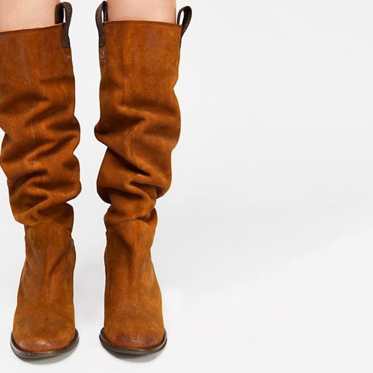 Brown knee-high boots on a white background