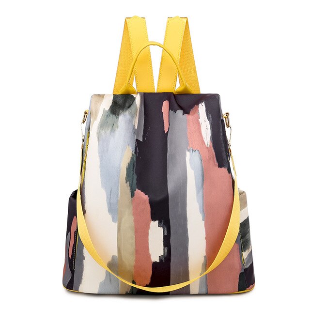 Backpack with abstract pattern and yellow straps on a white background