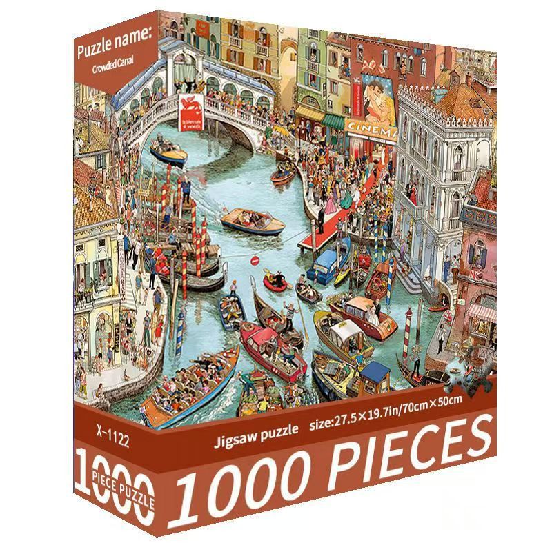 Jigsaw puzzle box with a colorful illustration of a canal scene, featuring buildings and boats.