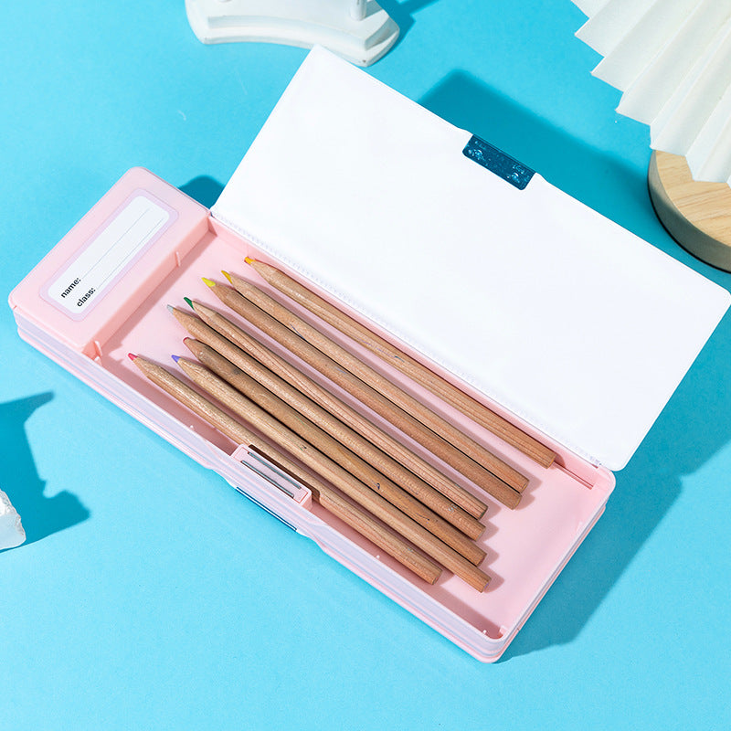 Set of wooden pencils in a pink case on a blue background