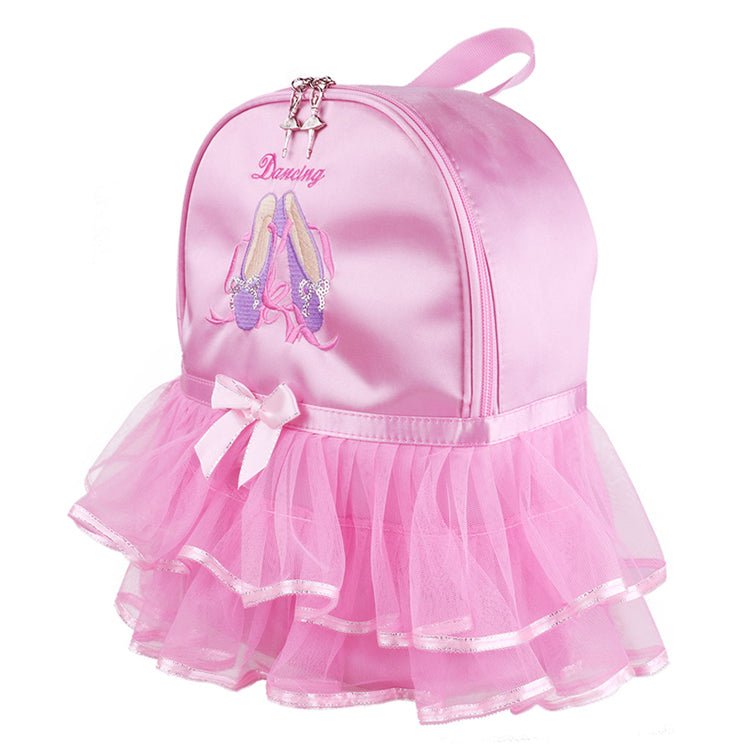 Pink backpack with ballet design and tutu skirt on a white background