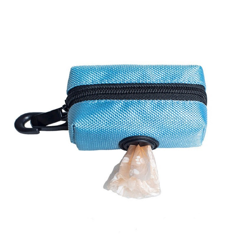 Blue pet waste bag dispenser with black zipper and clip on a white background