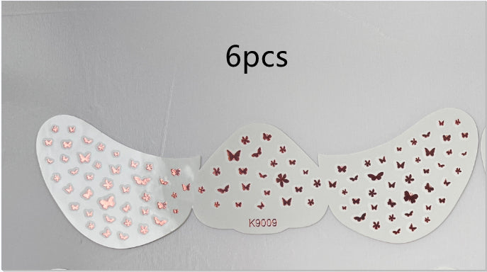 Set of three butterfly-themed nail art stickers on a gray background with '6 pcs' text.