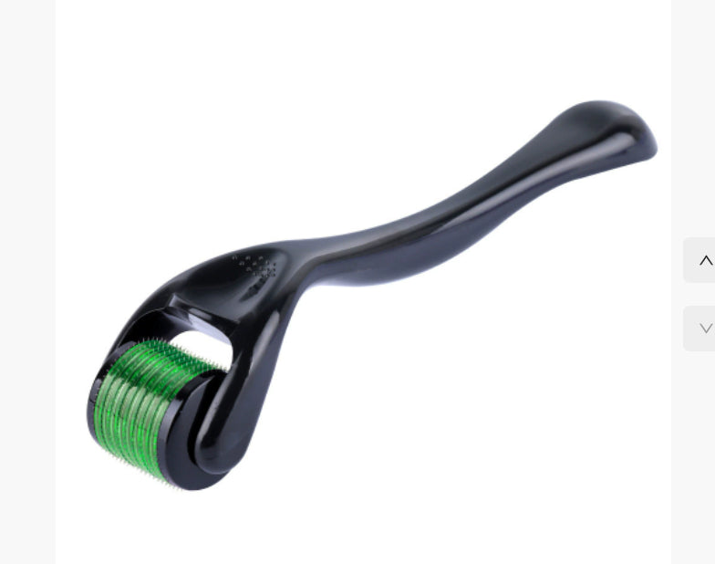 Black handheld tool with green cylindrical component on a white background
