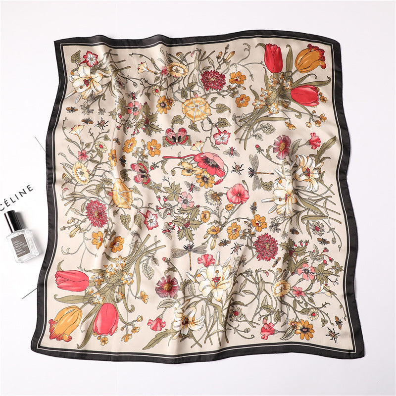 Floral patterned scarf on a white background with Celine branding.