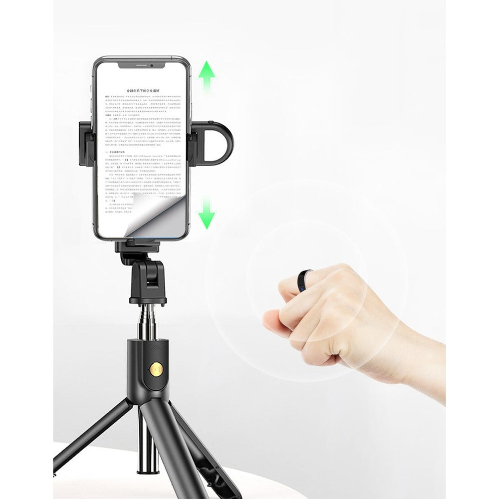 Phone holder with tripod and hand adjusting it on a white background