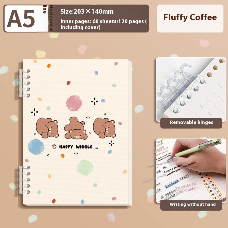 A5 size spiral-bound notebook with a cream cover decorated with three cute brown bear faces, colorful paint splatters, and the text 'HAPPY WIGGLE .