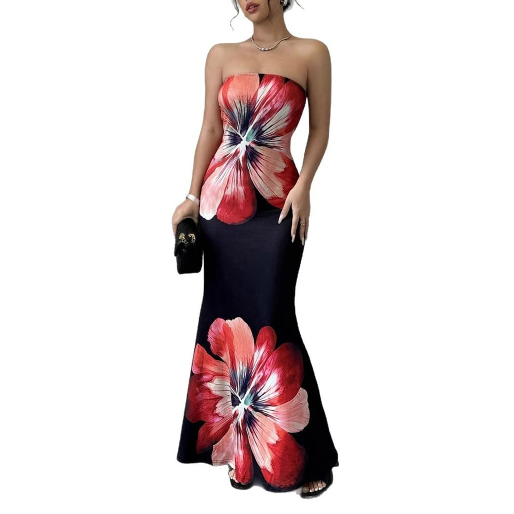 Woman wearing a strapless dress with floral design on a white background