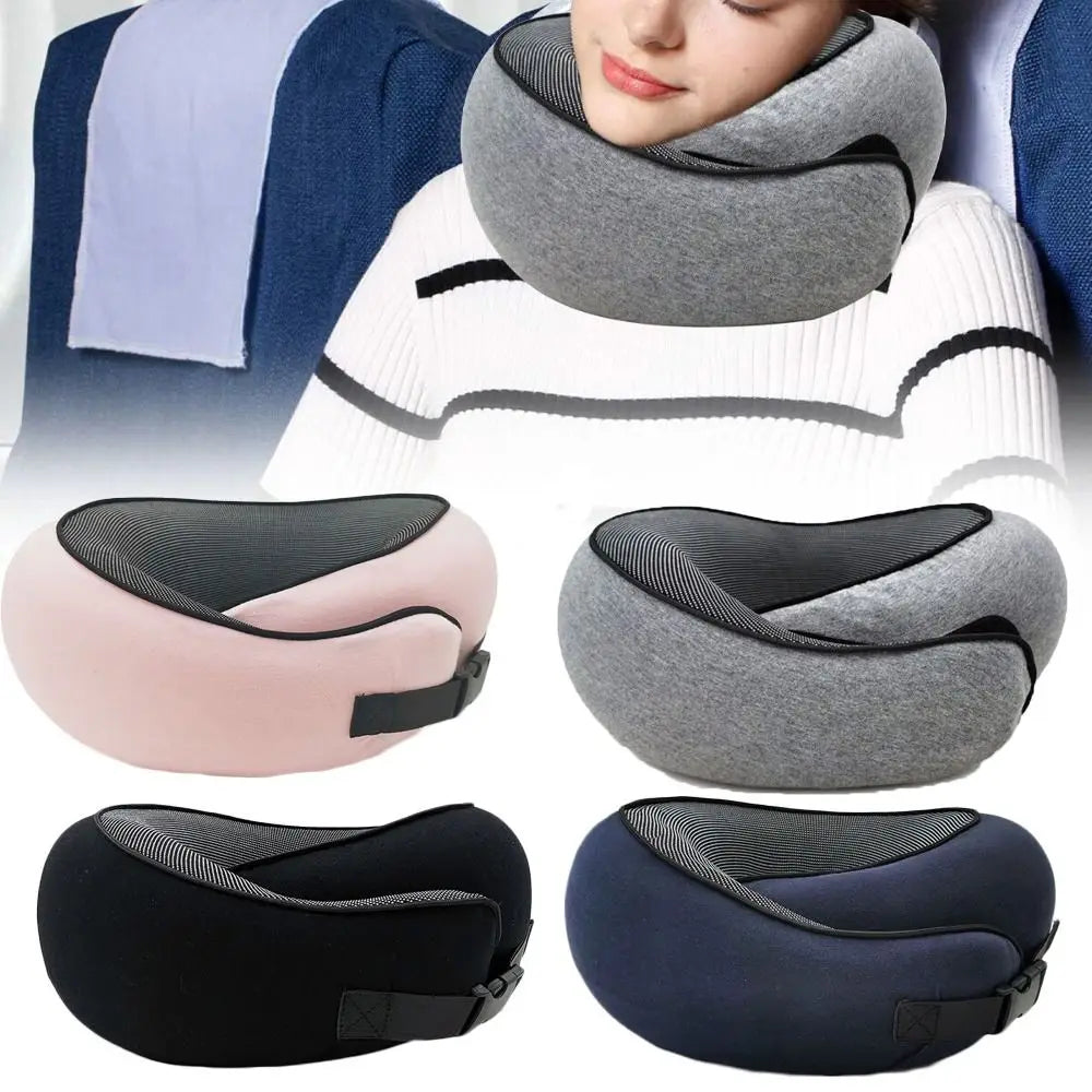 Gray travel neck pillow with a person wearing it, surrounded by additional pillows in pink, black, and navy.