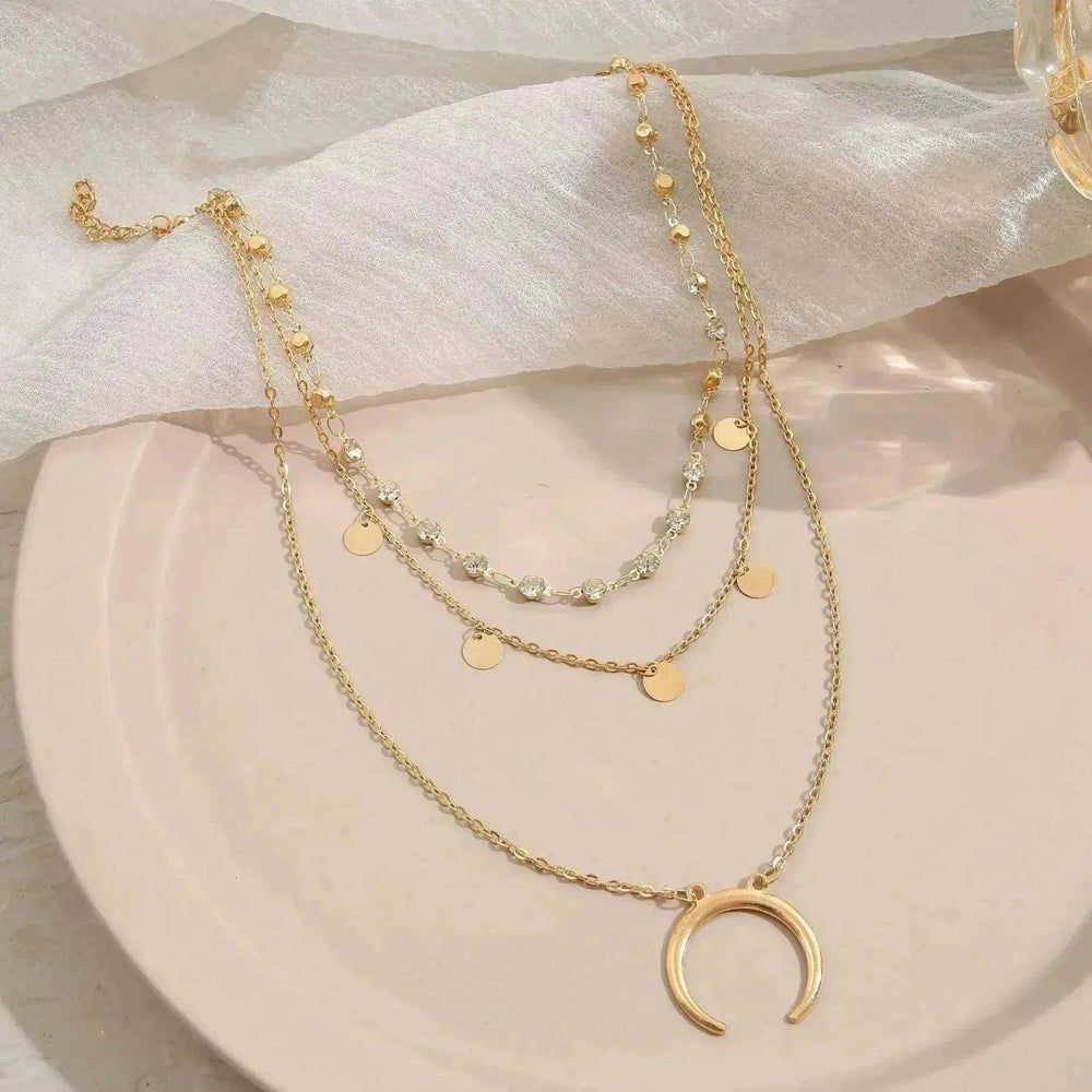 Collier européen et américain à petites tranches rondes avec pompon en forme de lune multicouche - EX-STOCK Canada