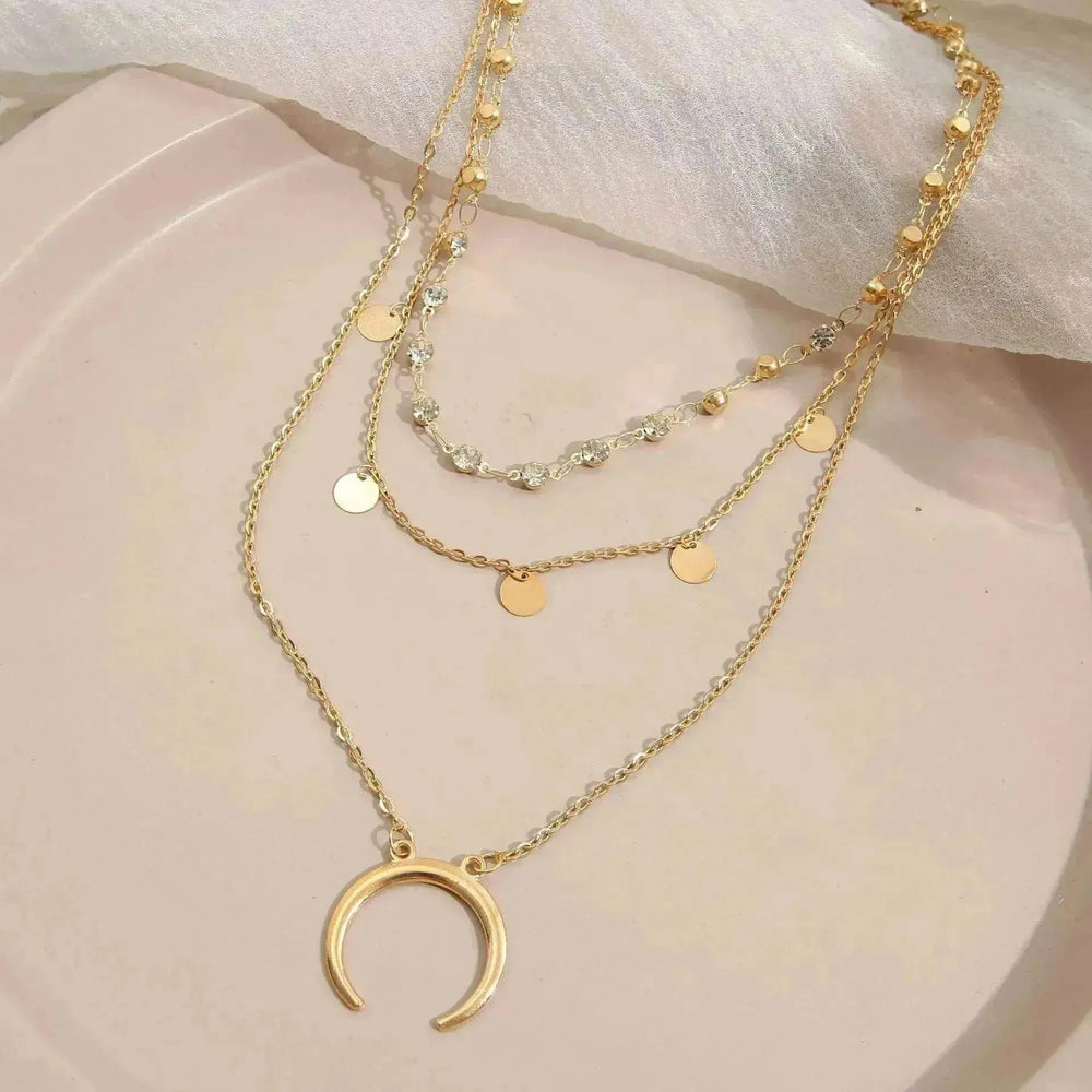 Collier européen et américain à petites tranches rondes avec pompon en forme de lune multicouche - EX-STOCK Canada