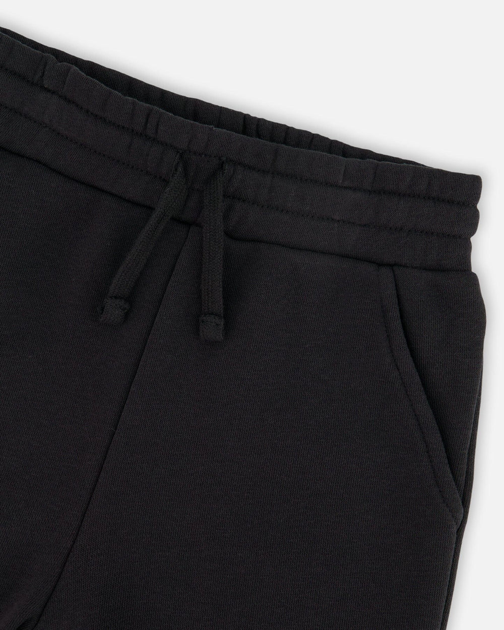 Pantalon de survêtement en terry français avec coutures croisées noir