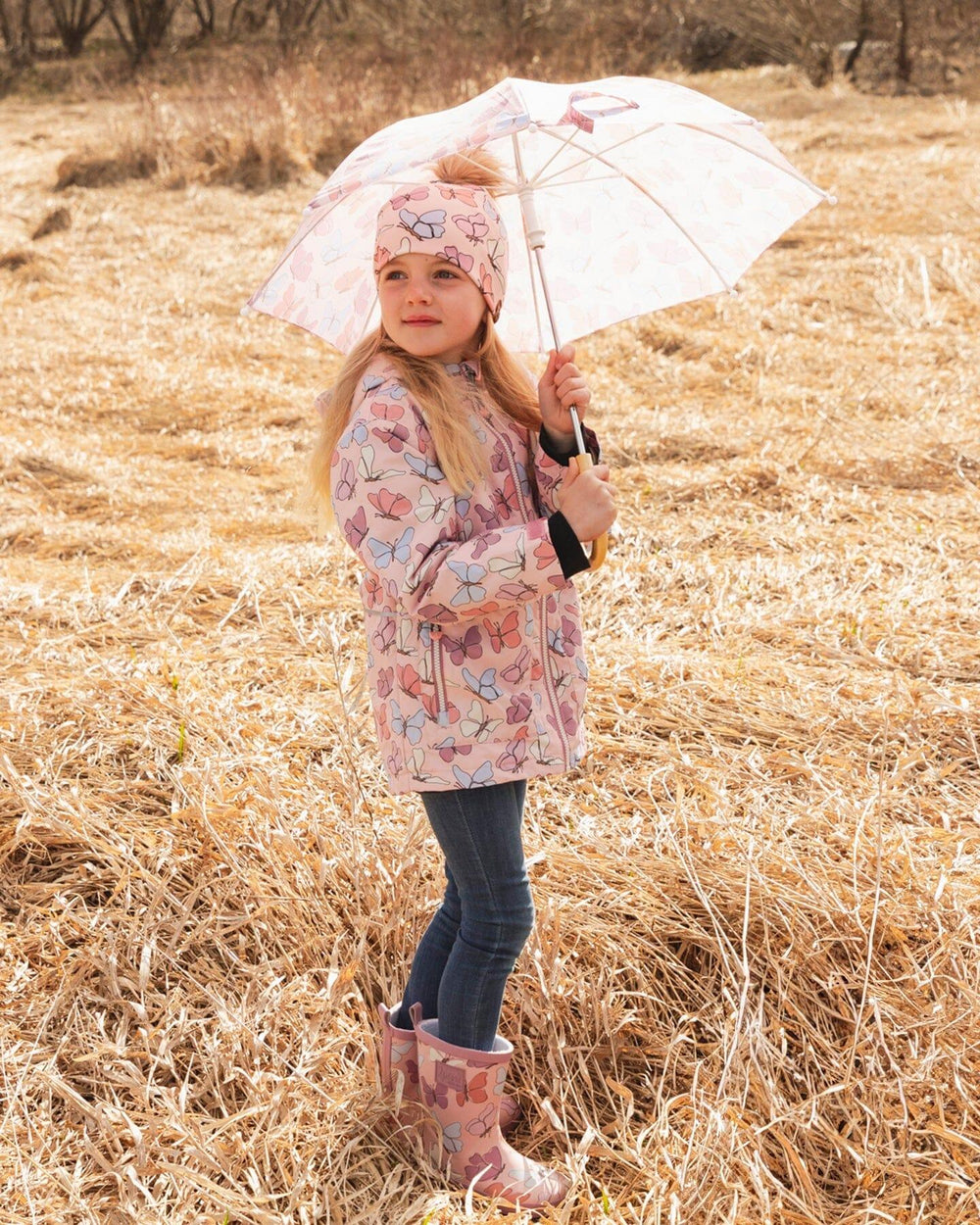 Veste mi-saison rose imprimée de papillons