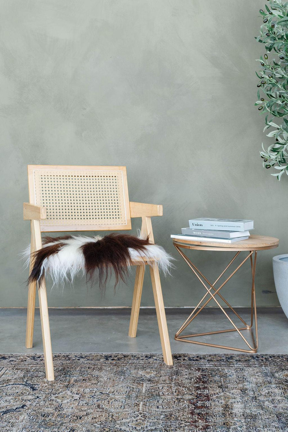 Coussin de chaise en peau de mouton islandaise tachetée brune | Aléatoire