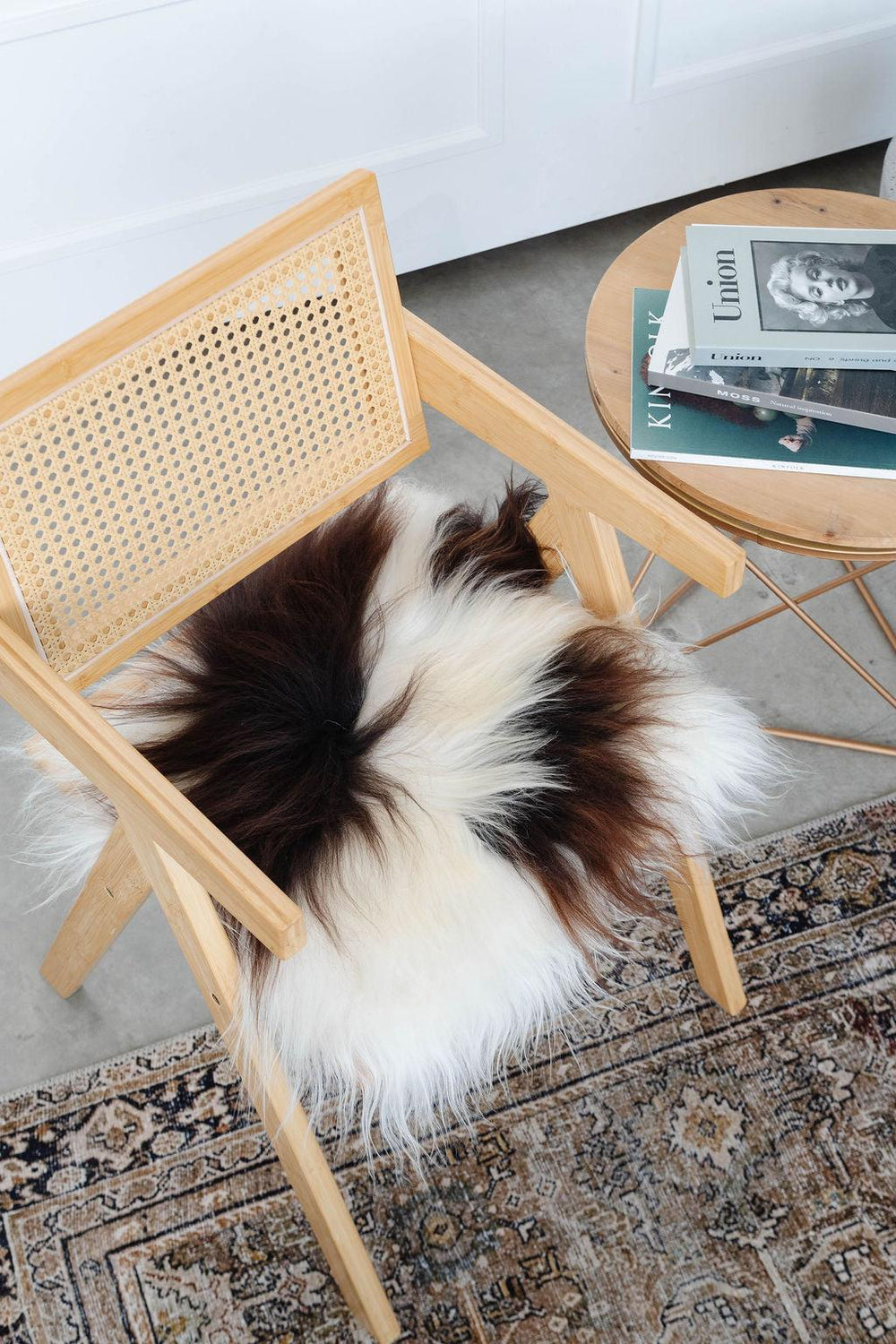 Coussin de chaise en peau de mouton islandaise tachetée brune | Aléatoire
