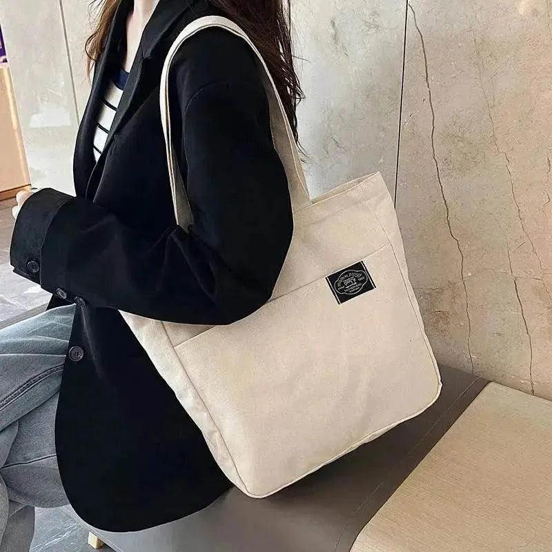 Sacs à main en toile style preppy pour femmes, couleur unie, simple, grande capacité, sac à bandoulière quotidien, multiples poches, sacs de shopping, sac fourre-tout pour filles et étudiantes. EX-STOCK Canada