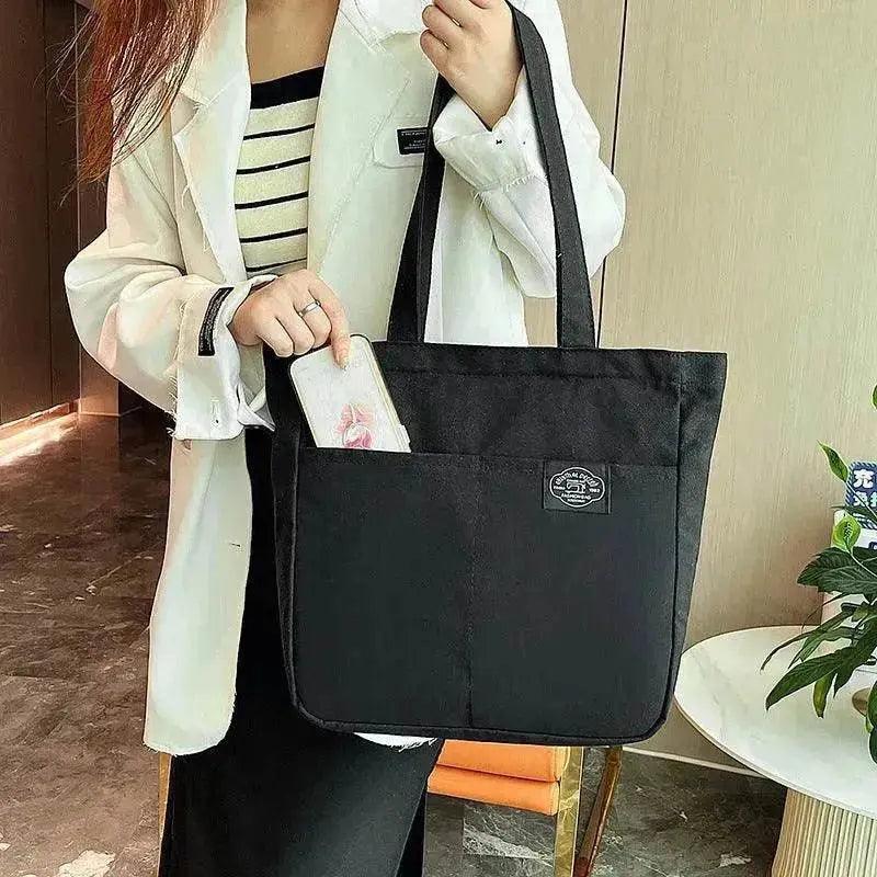 Sacs à main en toile style preppy pour femmes, couleur unie, simple, grande capacité, sac à bandoulière quotidien, multiples poches, sacs de shopping, sac fourre-tout pour filles et étudiantes. EX-STOCK Canada