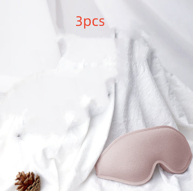 Pink sleep mask on a white fabric background with '3pcs' text above.
