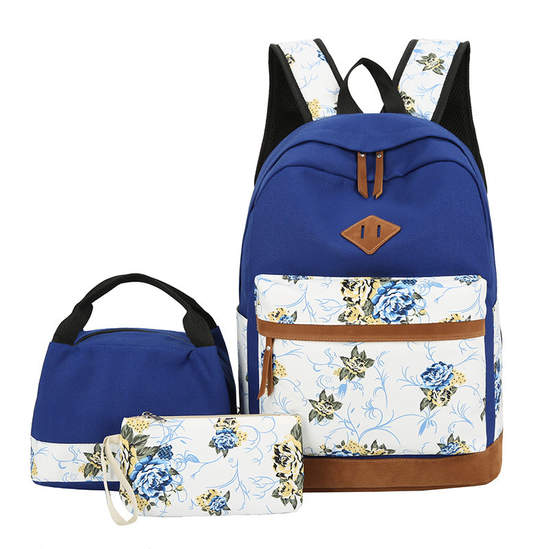 Blue floral-patterned backpack with matching pouch on a white background