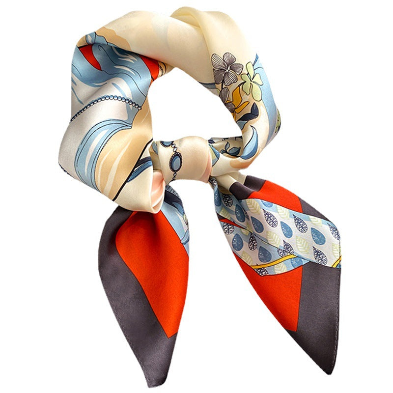 Colorful patterned scarf tied into a bow on a white background