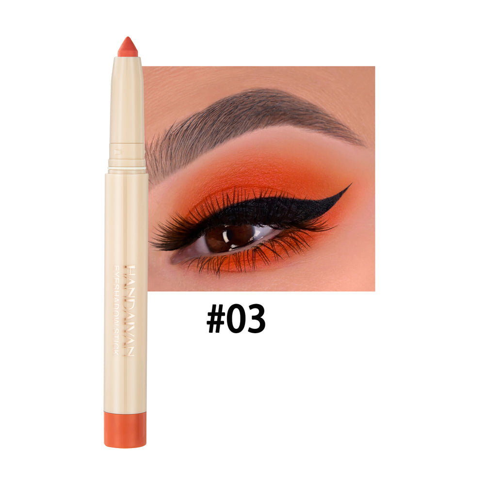 Eyeliner pencil with an eye makeup application example on a white background
