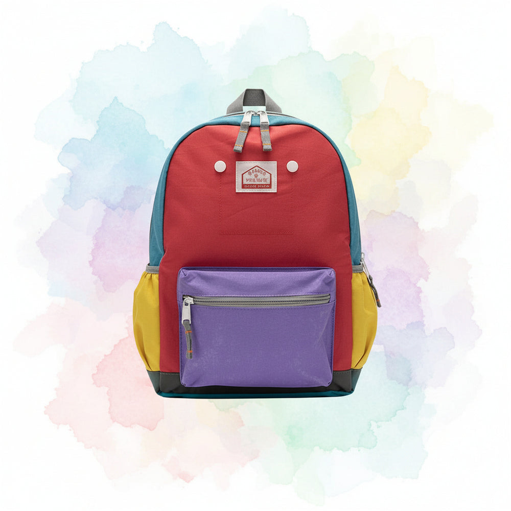 Colorful backpack with purple compartment on a white surface with decorative items.
