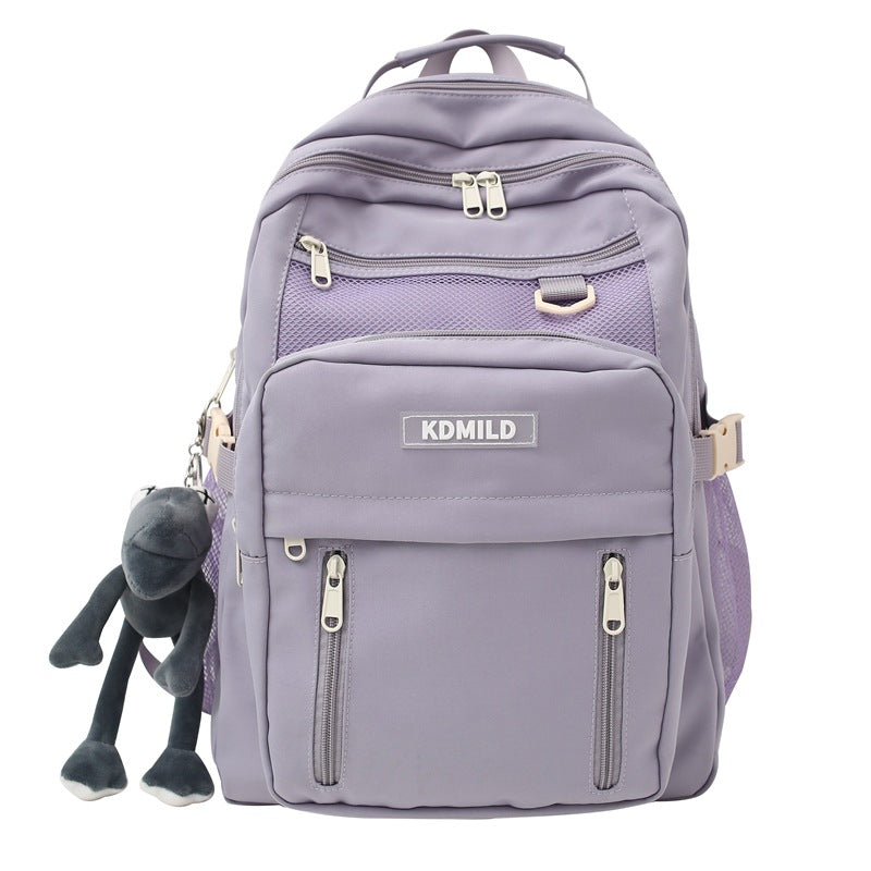 Purple backpack with visible brand logo on a white background