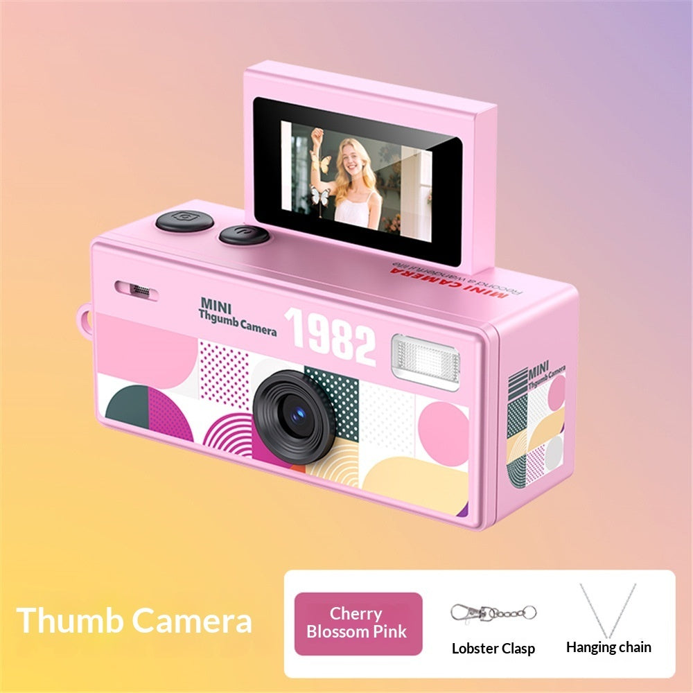 Pink instant camera with a screen on a gradient background