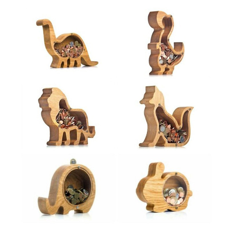 Set of six wooden animal-shaped coin banks on a white background