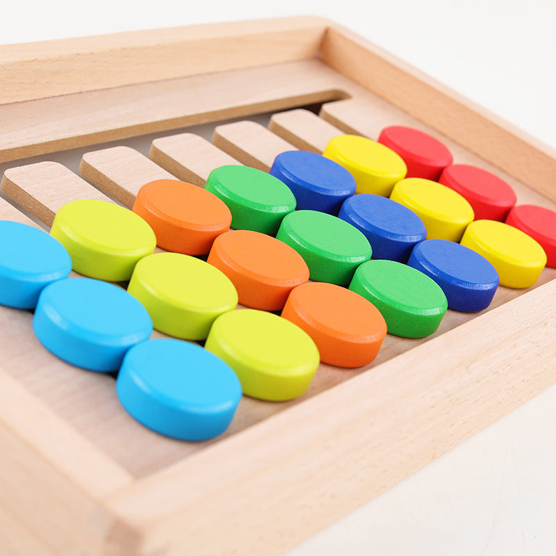 Colorful wooden blocks in a wooden tray
