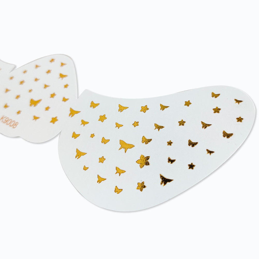 White patch with gold butterfly designs on a white background