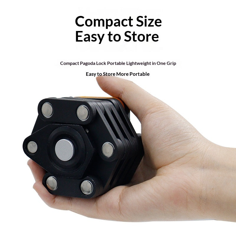 A hand holding a compact black Pagoda Lock portable lock, with text above reading 'Compact Size Easy to Store'.