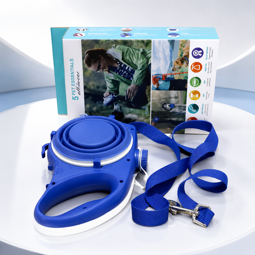 Blue retractable pet leash with a matching blue strap and metal clasp, displayed in front of its product box on a white surface.