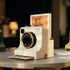 White camera-shaped latte art stencil tool with a coffee-themed stencil card