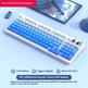 Mechanical keyboard with blue and white keys on a light blue surface, featuring text about connectivity options.