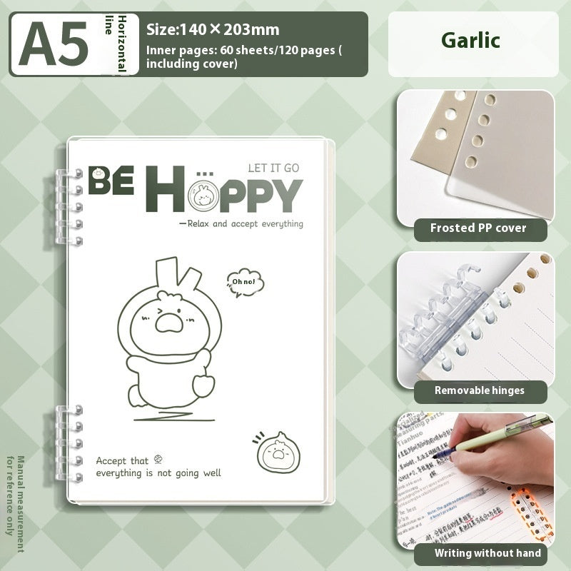 Notebook with cartoon character design on a green checkered background