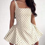 Women's white polka dot strapless mini dress front view