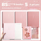 Set of pink notebooks and gel pens with 'Flower Story' branding on a light pink background.
