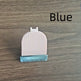 White grooming brush with blue base on a wooden surface, labeled 'Blue'.