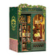 Model of an 'Owl Bookstore' with detailed interior and decorative elements.