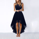 Woman wearing a black high-low dress on a white background