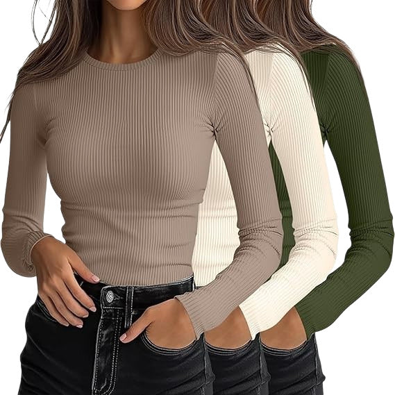 Three women wearing long-sleeve ribbed knit crop tops in taupe, cream, and olive green, paired with black jeans against a plain white background.