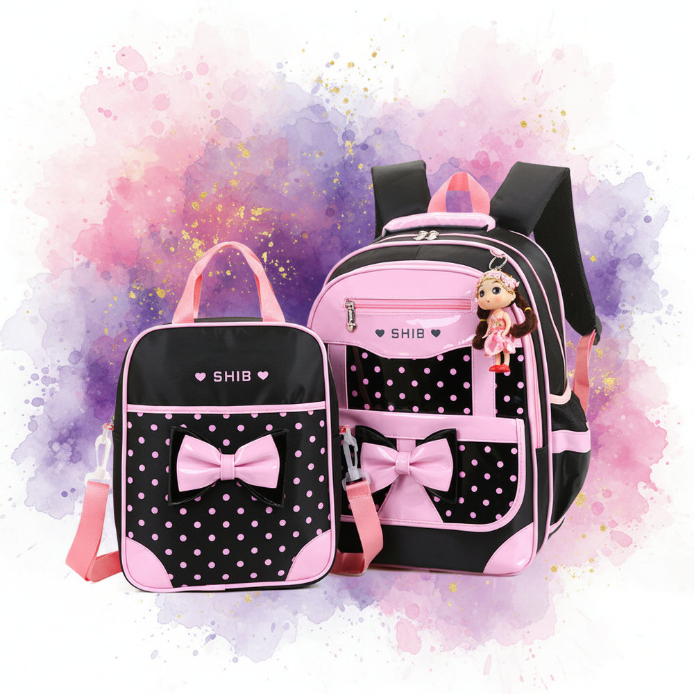 Black and pink polka dot backpack with a smaller matching lunch bag on a white background.