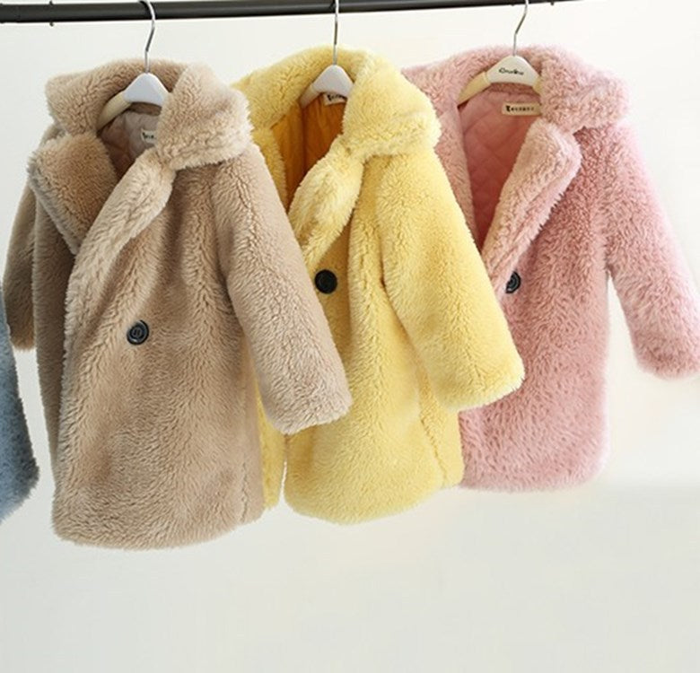 Three children's fur coats in beige, yellow, and pink hanging on a rack.
Kids Teddy Bear Faux Fur Coat | Children's Winter Overcoat White Brown Pink Beige Blue Yellow 90–140cm