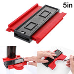 Tool with red base and black top, used for measurement or cutting, on a white background.