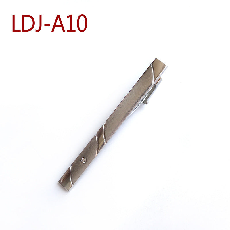 A metallic tie bar in a champagne gold finish with silver wavy accents, shown on a plain white background with the model number LDJ-A10 in red text in the upper left corner.