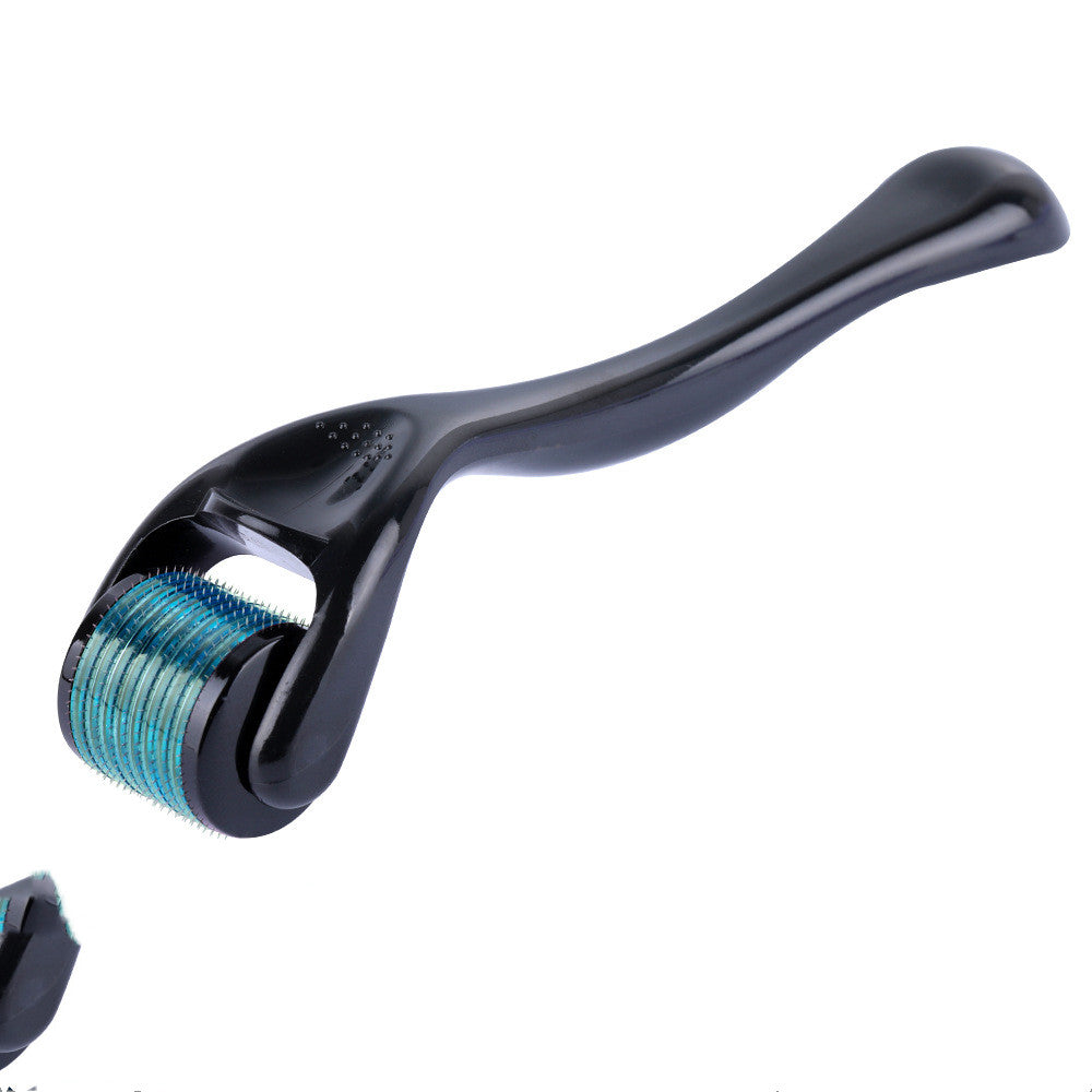 Black derma roller with blue metallic head on a white background