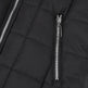 Close-up of a black puffer jacket with a zipper on a white background
